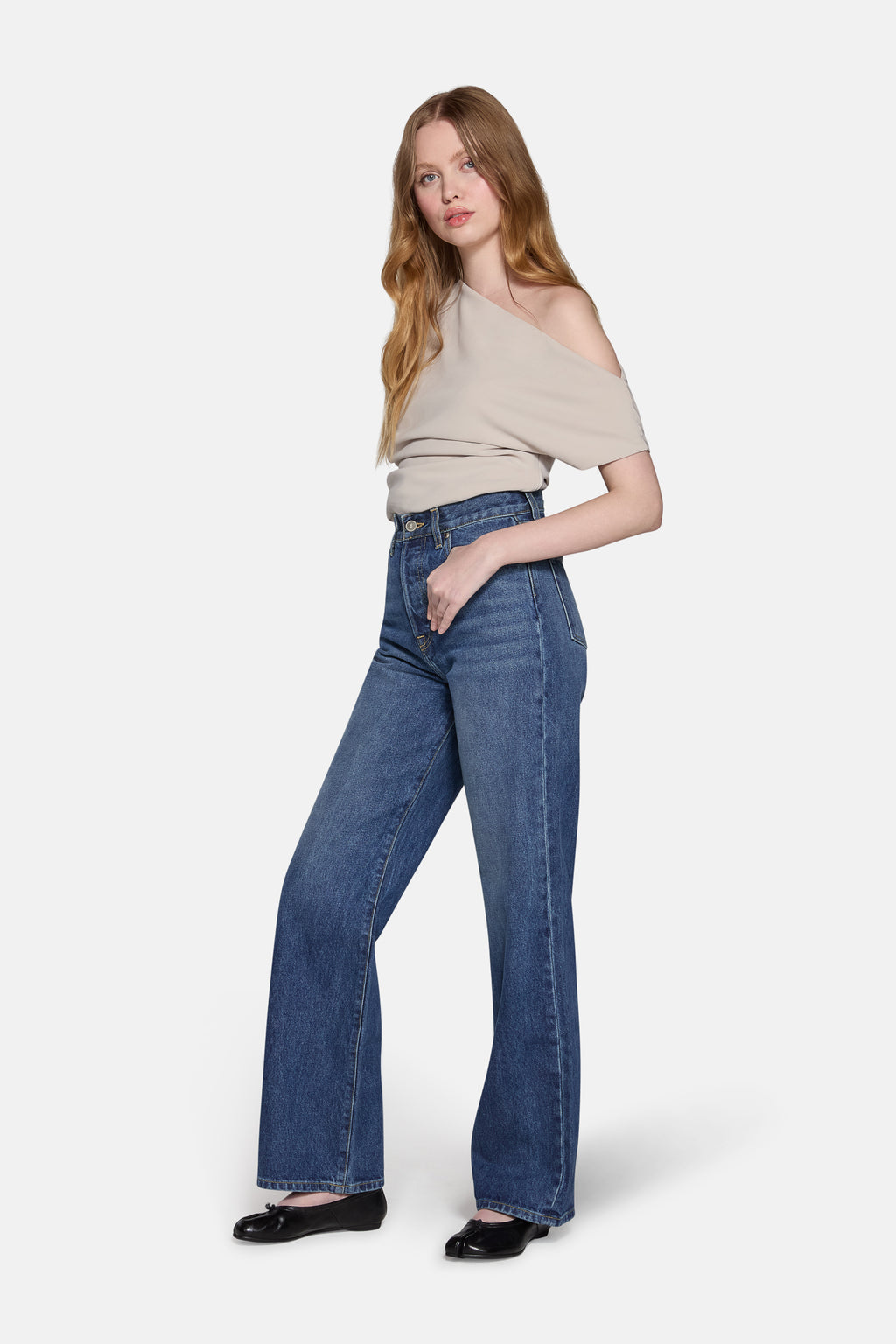 a blonde hair model, pictured wearing LKBlue high rise straight leg jeans for women in Navy 