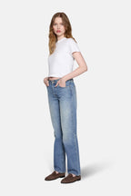 women wearing white top and light wash straight leg jeans for women by LKBLUE 