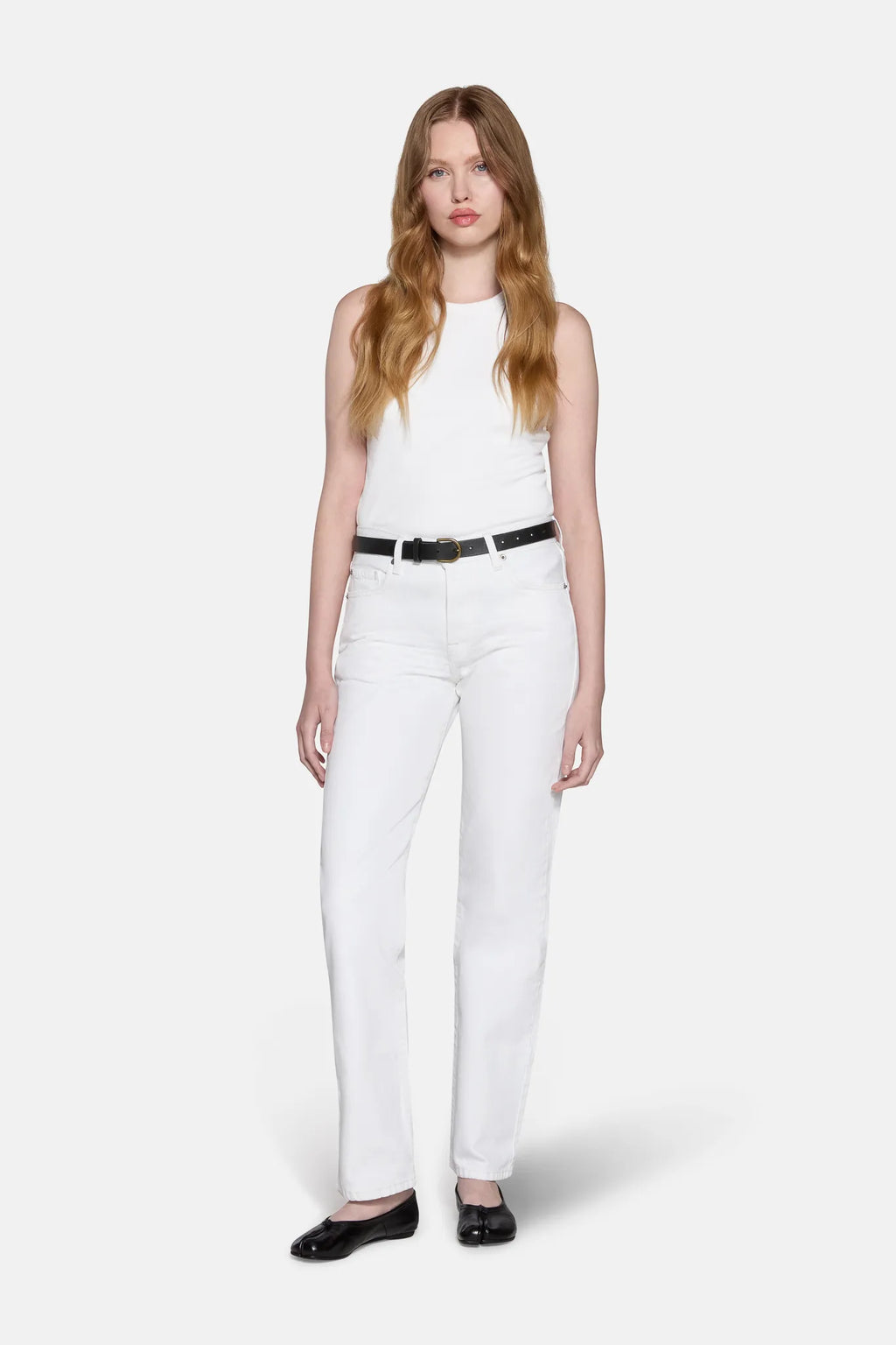 model modeling for light wash straight leg jeans