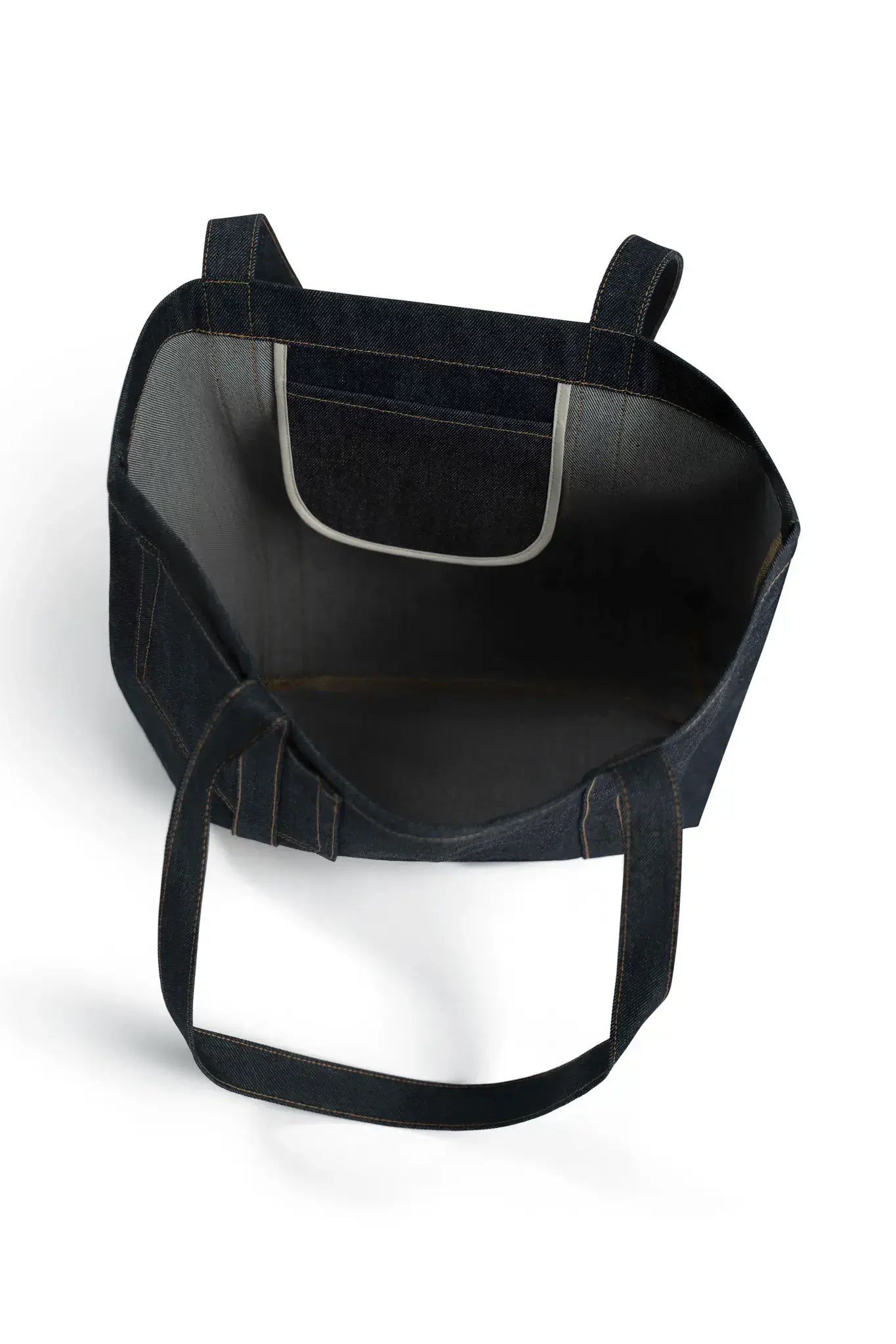 Black leather seat cover with straps on a white background