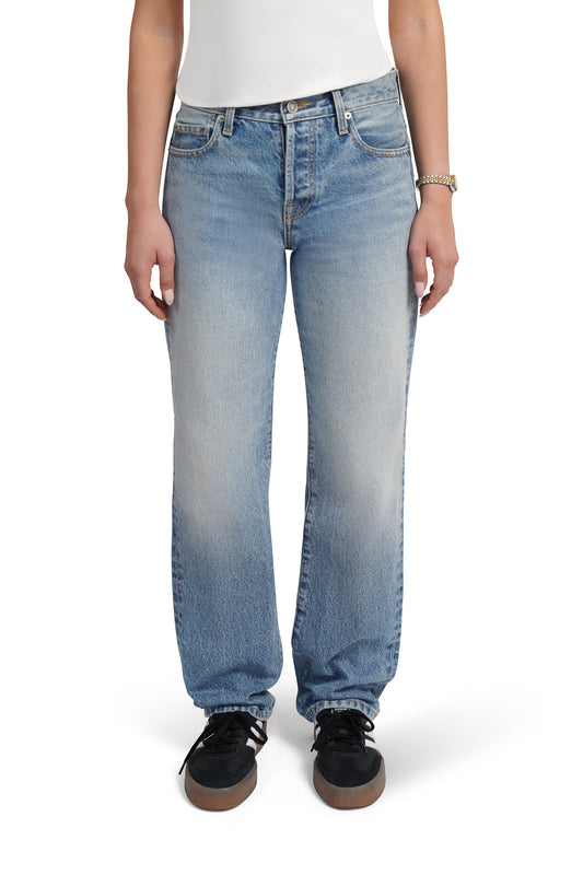 girl wearing lkblue straight leg enim jeans for women on a white background 